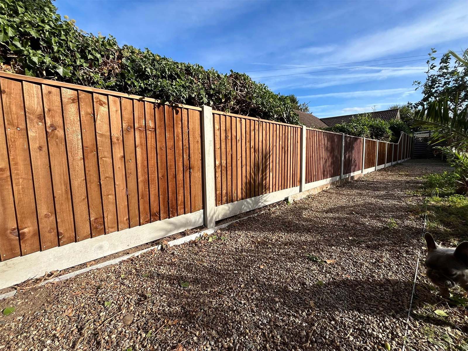 Custom wooden fencing installation in Ipswich garden